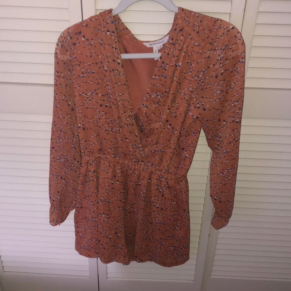 Orange long sleeve romper